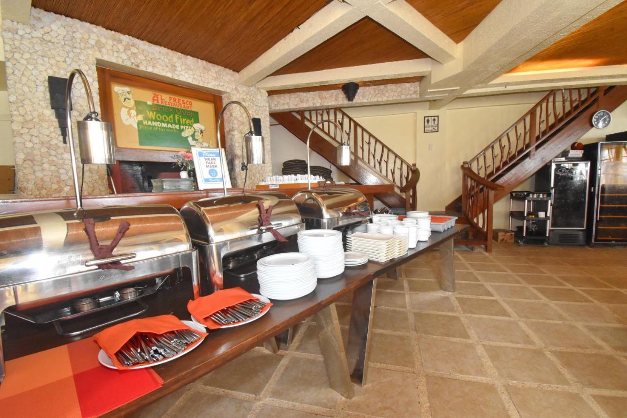 Ambassador In Paradise Balabag  Екстериор снимка A buffet at a hotel